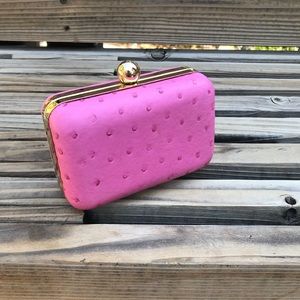 Used once pink vegan ostrich clutch